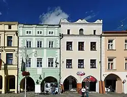 Čermákův dům (zelený vlevo)