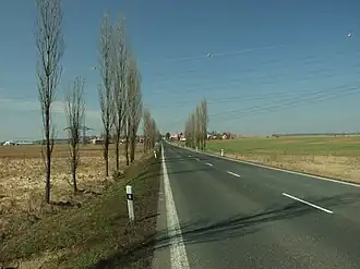 Silnice I/6 (nyní II/606) v Řevničově.