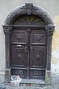 Šternberk - portál domu čp. 1142 v ul. Na Valech.jpg