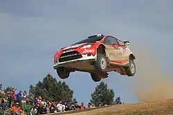 Jevgenij Novikov s vozem Ford na Sardinské rallye 2011