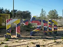 Vjezd do vesnice Cholit