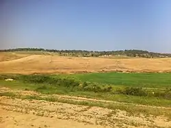 Plocha budoucí obce Karmit v r. 2012