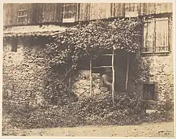Rustic Building with Man under Trellis