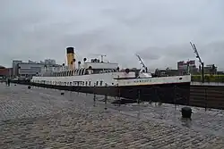 SS Nomadic v suchém doku s obnoveným nátěrem v barvách White Star Line (2020)