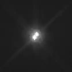 Patroclus a jeho průvodce Menoetius z Hubbleova teleskopu (2018)