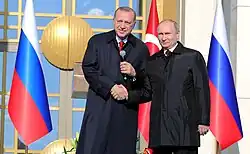 Recep Tayyip Erdoğan a Vladimir Putin při slavnostním zahájení stavby jaderné elektrárny Akkuyu dne 3. dubna 2018 v Ankaře