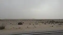 Vzdálený pohled na hřeben Kurajn Abú al-Baul