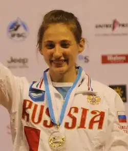Alina Gajdamakinová na stupních vítězů na MS 2014 v lezení na rychlost, Gijón