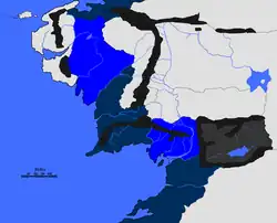 Království Dúnadanů ve vyhnanství (modře) a kolonie Númenoru (tamvě modře), krátce po zkáze Númenoru, 3320 D.v.