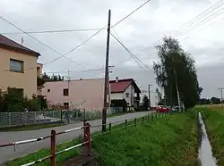 Jediná ulice Bílé Břízy kolem Oldřišovského potoka