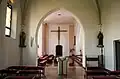 Interiér – pohled z vedlejší kaple do příčné lodi