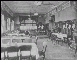 Vnitřek restaurace na dobové pohlednici (1904)