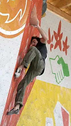 Stéphane Julien v semifinále SP 2010 v boulderingu ve Vídni