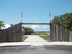 Wooden gateway open to the ocean