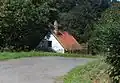 Domek u příjezdu do vsi
