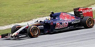 Carlos Sainz Jr. řídící vůz STR10 při Grand Prix Malajsie 2013.