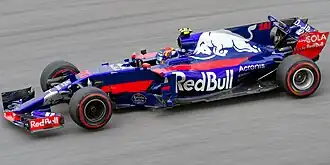 Carlos Sainz Jr. řídící vůz STR12 při Grand Prix Malajsie 2017.