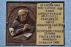 Pamětní deska na jemu zasvěceném kostele v Santhià