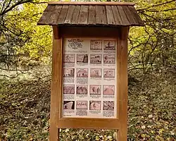 Ručně malovaná infotabule od D. Nesnídala na Cestě za pověstí na svazích Vladaře