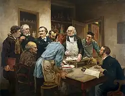 muži stojící kolem stolu se zvířetem