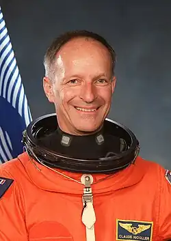 Claude Nicollier roku 1999, před letem STS-103