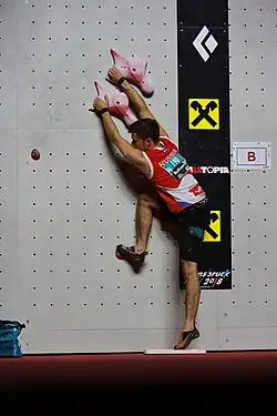 Alexandr Šikov v osmifinále MS 2018 v lezení na rychlost v Innsbrucku