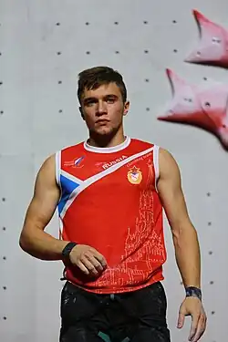 Alexandr Šikov ve čtvrtfinále MS 2018 v lezení na rychlost v Innsbrucku