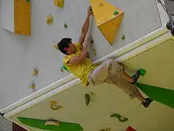 David Lama během lezení na 1. závodu Free Solo Master v Linci (září 2014)