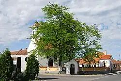 Část obce a kostel sv. Brikcí