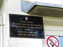 Označení dolnostřežanské základní školy