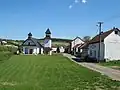 Náves s kaplí svatého Vojtěcha z roku 2011