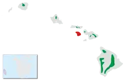 Rozšíření šatovníka šarlatového na Havajských ostrovech (červeně vyhynulé populace)