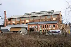 Jedna z budov bývalého dolu v roce 2021