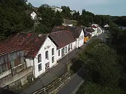 Elektrárna, postavená u Lužnice v Táboře podle návrhu Františka Křižíka, byla ve dne využívána pro pohon dráhy Tábor-Bechyně a v noci pro osvětlení města.jpg