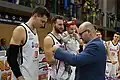 Starosta Nového Jičína Stanislav Kopecký předává hráčům ČEZ basketball Nymburk medaile za vítězství v Českém poháru v basketbalu (Nový Jičín, 2019)