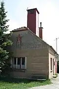 Hasičská zbrojnice s komunistickou výzdobou