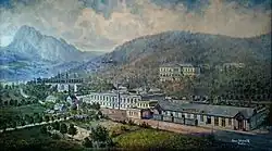 Historická malba nádraží v Bílině Kyselce z konce 19. století s vrchem Bořeň na pozadí. Dominantou je areál stáčírny a úpravny minerálních vod z okolních pramenů, včetně vlečkové koleje se čtyřmi nákladními vozy, do kterých se balené vody nakládaly. Také je k vidění velká rezidence v zalesněném svahu, několik domků a hřiště v blízkosti stáčírny. Silnici, přicházející zleva ze samotného města Bílina, lemuje okrasné stromořadí.