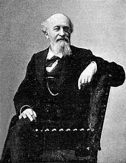 Portrét sedícího Gastona Parise, francouzského filologa a zakladatele romanistických studií