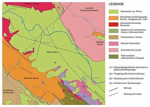 Barevná fotografie s reprodukcí geologické mapy zachycují výskyt hornin v městské oblasti s legendou