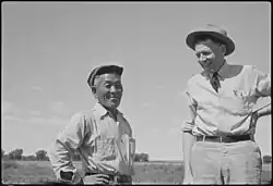Granada Relocation Center, Jitsumi Abe, unit supervisor, and John N. Spencer, Chi