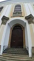Dřívější vchod do kostela svaté Kláry s barokními vraty