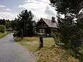 Jedna z chalup (replika původního horského stylu) na Horské Kvildě