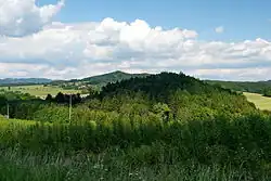 Vrch Hrádek, za ním Střelečská hůra
