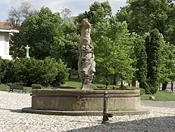 Kašna se sochou Tritona