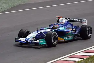 Jacques Villeneuve řídící vůz C24 při Grand Prix Kanady 2005.