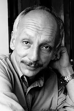 portrét fotografa a galeristy Jana Adamce