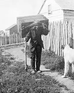 John Hornby with a tump line, his customary pack, at Fort Resolution