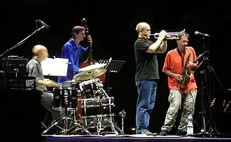 Členové skupiny Masada: Joey Baron (bicí), Greg Cohen (kontrabas), Dave Douglas (trubka) a John Zorn (saxofon)