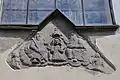 Reliéf nad vchodem kostela