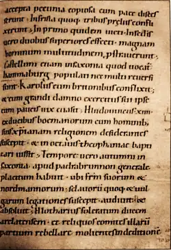 Na obrázku je stránka ze Schlettstadského rukopisu Fuldských letopisů psaného latinsky. Je zde zaznamenána zpráva o křtu čtrnácti českých knížat roku 845.